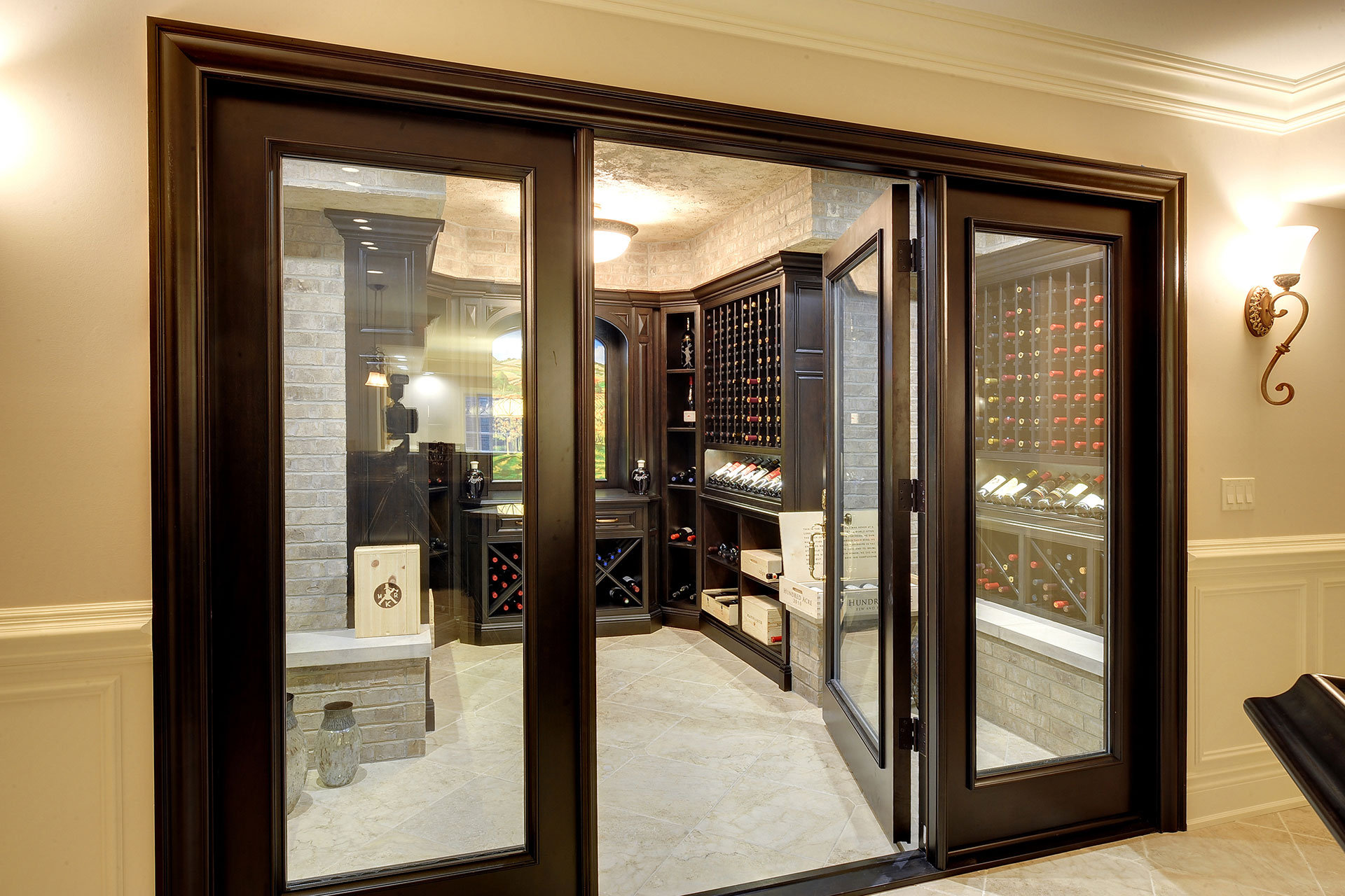 See through, custom made glass panel wine cellar entry system.  - Glenview Haus - Custom Doors, Wine Cellars and Cabinets in Chicago