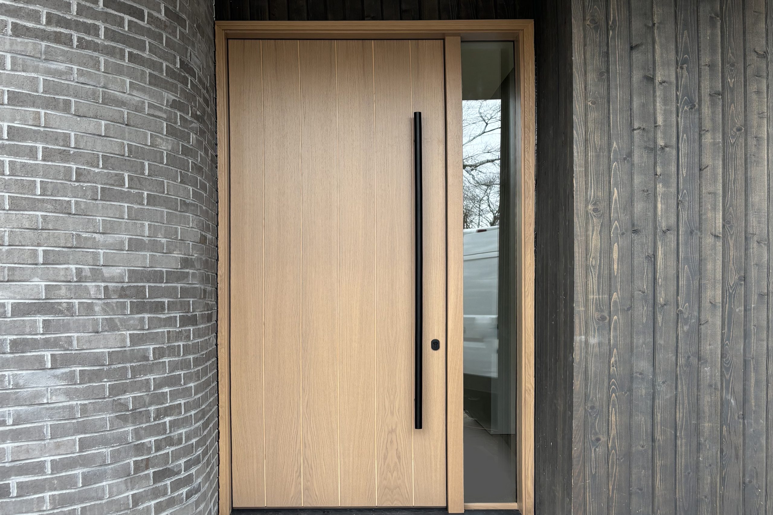 Modern Entry Door with Black Pull Bar